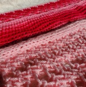 Pink hand knitted and crochet blanket